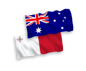 National vector fabric wave flags of Australia and Malta isolated on white background. 1 to 2 proportion.