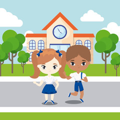 Obraz na płótnie Canvas cute little students front of school building