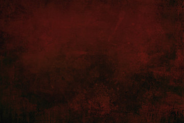 Splattered red paint on a canvas, grungy background or texture