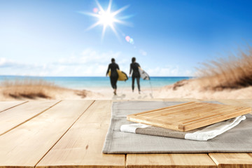 Wooden table background in the sunshine in the summer