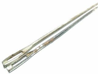 A picture of rusted needles on white background