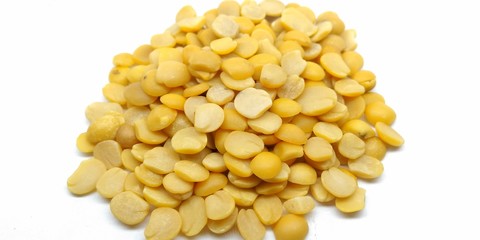 A picture of split pigeon peas isolated on a white background