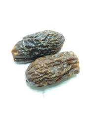 A portrait picture of dry fruits on white background