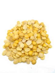 A portrait picture of split pigeon peas on white background