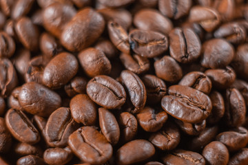 Coffee beans close up. Coffee production industry concept