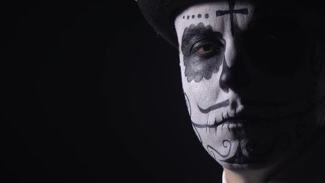 Close up of a man with his face painted as a skull, Santa Muerte, 4k