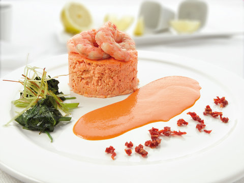 Pastel de pescado, cabracho con salsa. Fish cake, scorpion fish with sauce.