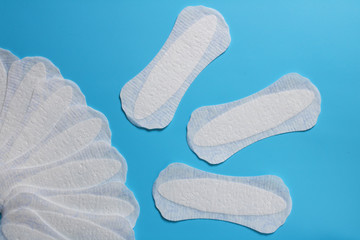 women's hygiene products, daily sanitary pads, space for text, cleanliness and freshness, women's health, gynecology