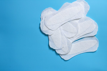 women's hygiene products, daily sanitary pads, space for text, cleanliness and freshness, women's health, gynecology