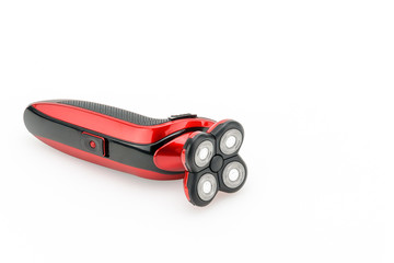 Electrical red shaver, haircut on the white mat background