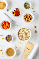 Ingredients for cooking homemade granola (muesli). Healthy breakfast.