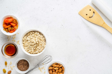 Ingredients for cooking homemade granola (muesli). Healthy breakfast.