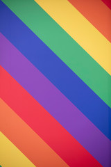 The colours of the LGBT gay pride rainbow flag diagonal background