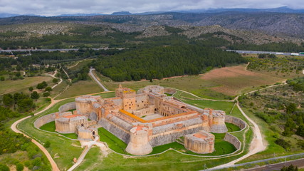 Landscape of Fort of Salses and Salses le Chateau, listed as a monument historique by the French Ministry of Culture.  Salses-le-Château fields and village as a background.