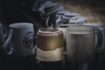 Tea cups on the fence