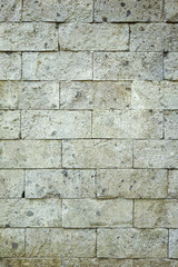 Facade of building, the stone wall background