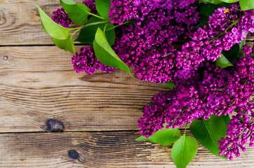 Beautiful lilac on old vintage wooden background