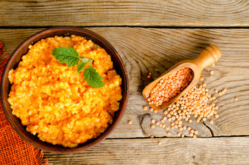 Vegetarian food, porridge with pumpkin and lentils.