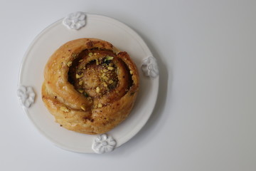 Pistachio Cinnamon Bun on White Background