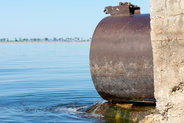 Discharge of toxic or contaminated water into a river or lake.