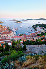 Evening view of old harbor in Hvar town, Croatia