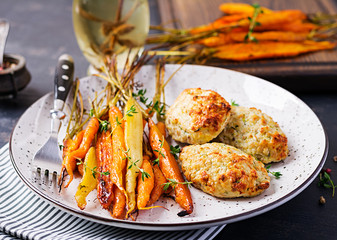 Baked organic carrots with thyme and cutlet/meatball chicken meat and zucchini. Diet food.