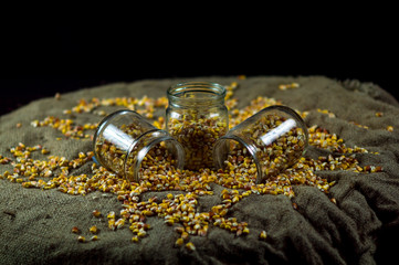 corn grain poured into glass jars