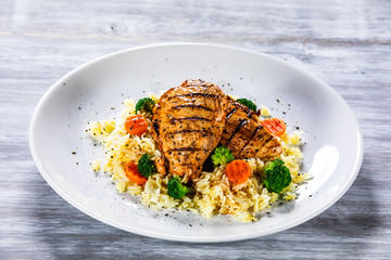 Grilled chicken fillets, rice and vegetables