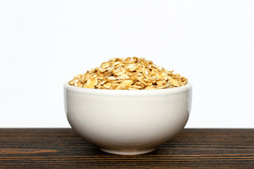 raw oatmeal in a bowl.