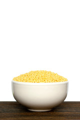 raw millet in a bowl.