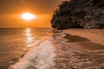A fantastic sunset at the beach with a bonfire and BBQ on the island of Curacaio