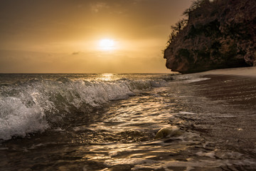 A fantastic sunset at the beach with a bonfire and BBQ on the island of Curacaio