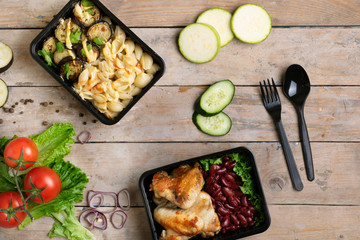 vegetables from garden and food containers. Business lunch boxes