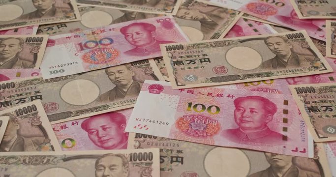 Stack of RMB anda Japanese Yen