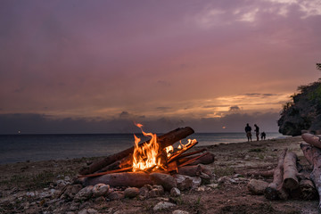 A fantastic sunset at the beach with a bonfire and BBQ on the island of Curacaio