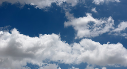 blue sky and white clouds.Freshness of the new day. Bright blue background. Relaxing feeling like being in the sky.