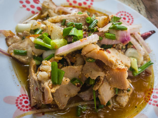 Sliced grilled beef salad in plate. spicy Thai style