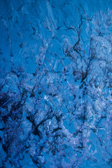 Paint strokes and stains blue abstract background