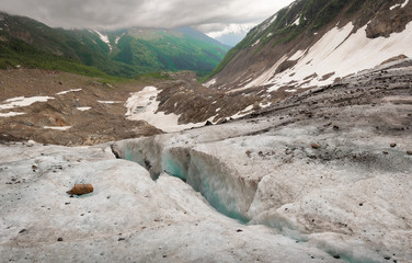 Mountain glaciers and large blocks of snow with ice in the eternal glaciers in Alibek, Dombay, Karachay-Cherkess Rep. Russia