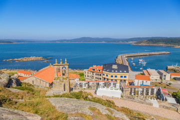 Naklejka premium Muxia, Spain. St. Mary's Church, bay, port