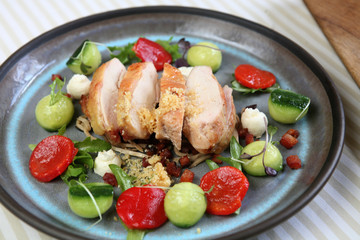country chicken breast with porcini mushrooms, smoked bacon vinegar sauce, nut praline, smoked cheese cream