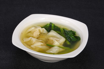 Asian traditional Wonton soup with herbs