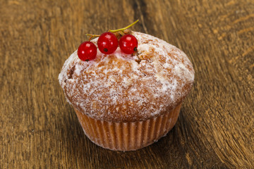 Sweet tasty muffin with red currants