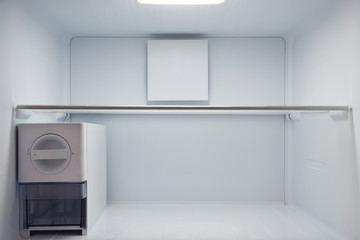 Inside of empty and clean modern refrigerator