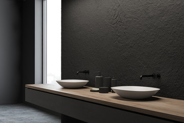 Fototapeta na wymiar Side view of double sink in grey bathroom