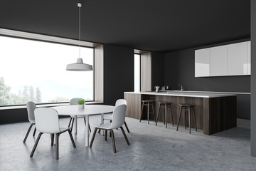 Grey kitchen corner with bar and table