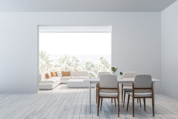 White dining room and living room interior