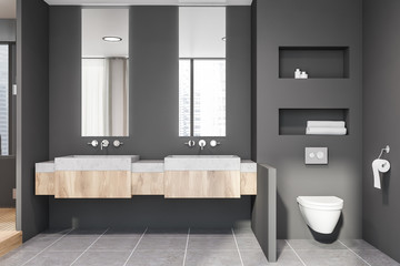 Fototapeta na wymiar Double sink and toilet in grey bathroom