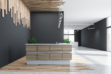 Side view of gray and wooden office reception