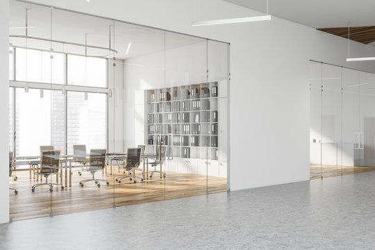 White meeting room with bookcase
